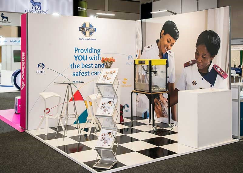 Brochure stands in use at an exhibition stand