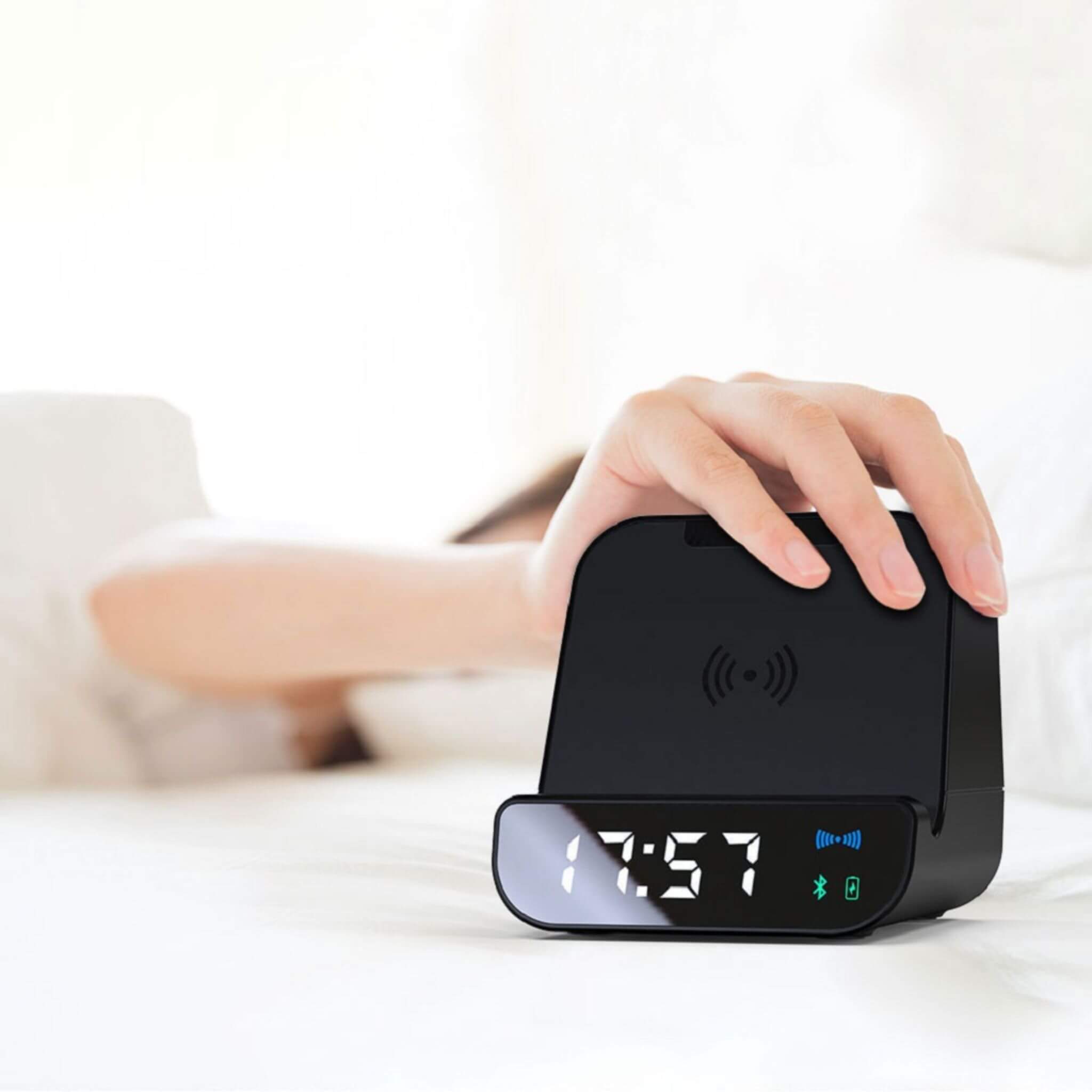 5-Watt Speaker 4000mAh-Wireless Powerbank and Alarm Clock in use