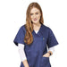 Woman wearing navy scrub top