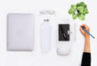 White stainless steel bottle combined with other office accessories