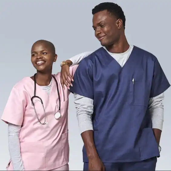 Two smiling medical professionals wearing scrubs.