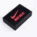 Tempered glass power bank branded with the Nike logo