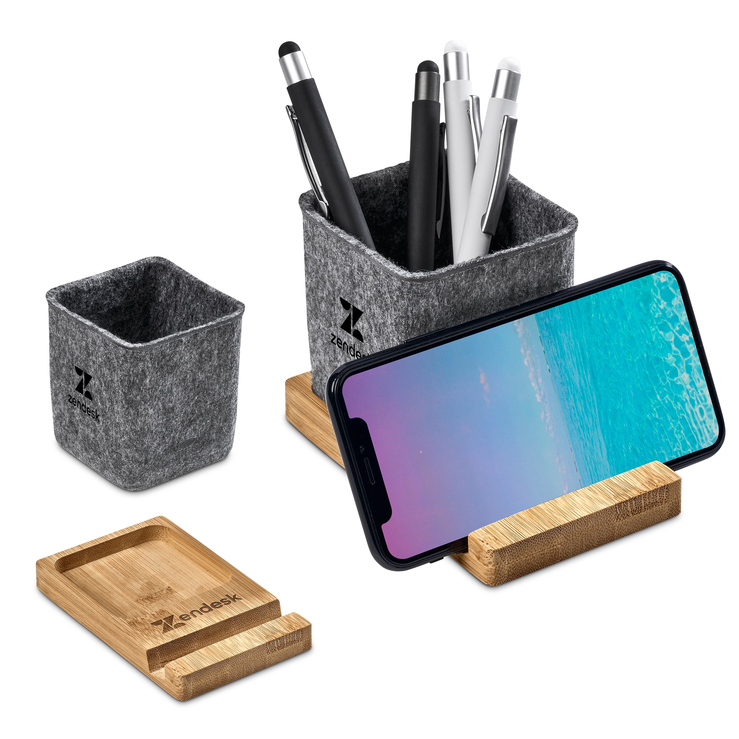 bamboo felt rpet shown in use with pens in the container and a phone on the stand